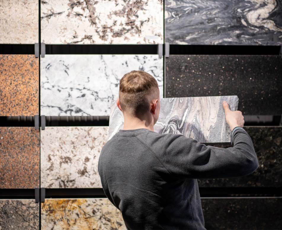 Man choosing materials for countertops