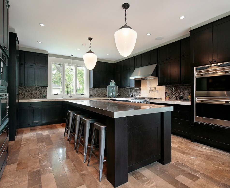 Dark cabinets with a large kitchen island