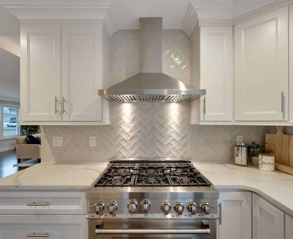 Kitchen with an industrial stove and hood in New Jersey