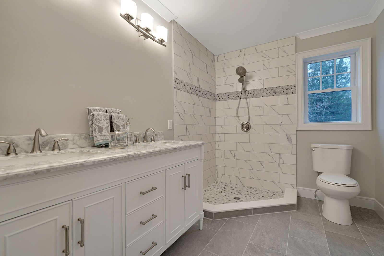 Bathroom remodel with double vanity and tiled shower on Sunset Ave, Point Pleasant NJ