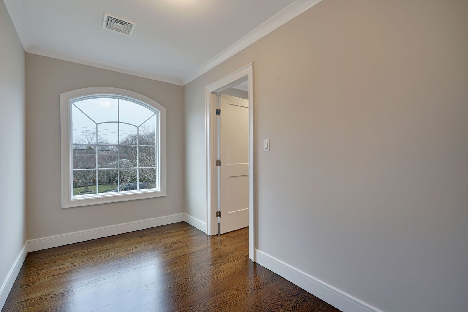 Bedroom with arched window, second-floor remodel on Sunset Ave, Point Pleasant NJ