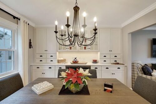 dining room with a large chandelier